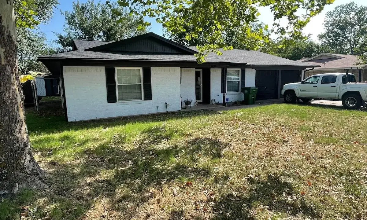 Professional roofing crew working on a residential roof in Salida del Sol Estates